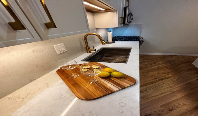 Open white kitchen, hardwood