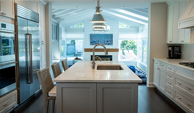 Open white island kitchen